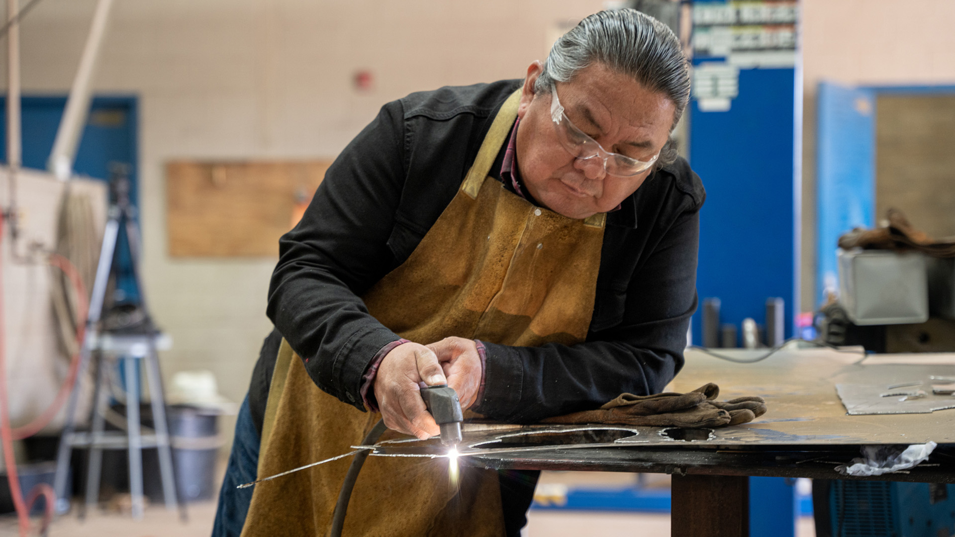 Indigenous Navajo Man Welding