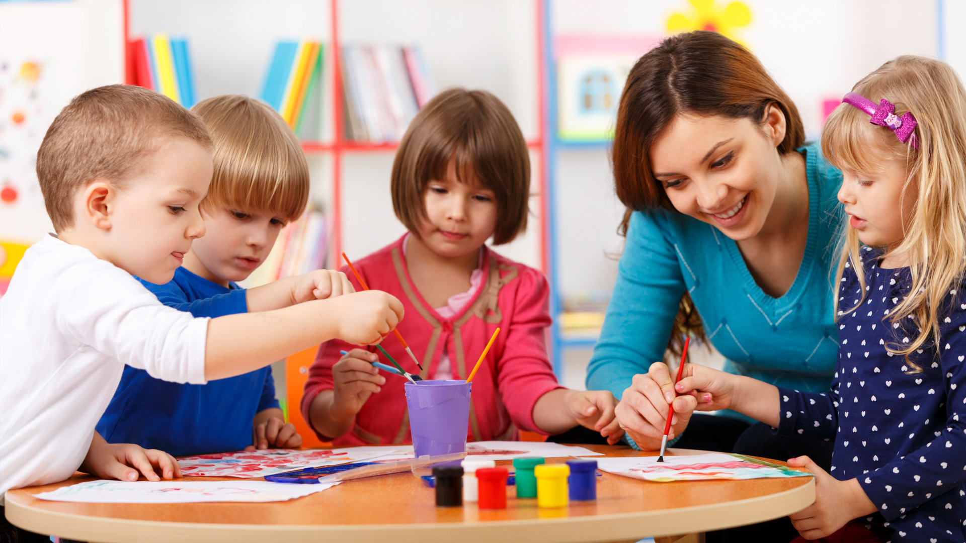 Group of Elementary Age Children in Art Class With Teacher