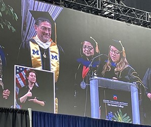 Receiving an honorary associate degree from San Antonio College